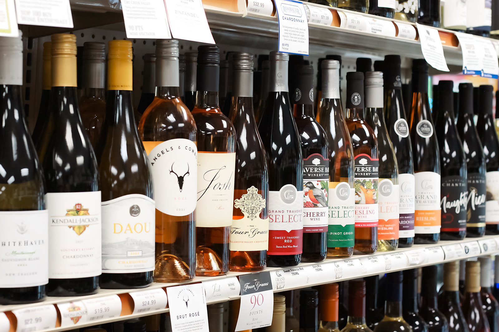Wine shelves at Bay Party Store — Chardonnay, Kendall-Jackson, DAOU, Josh, Traverse Bay, and more