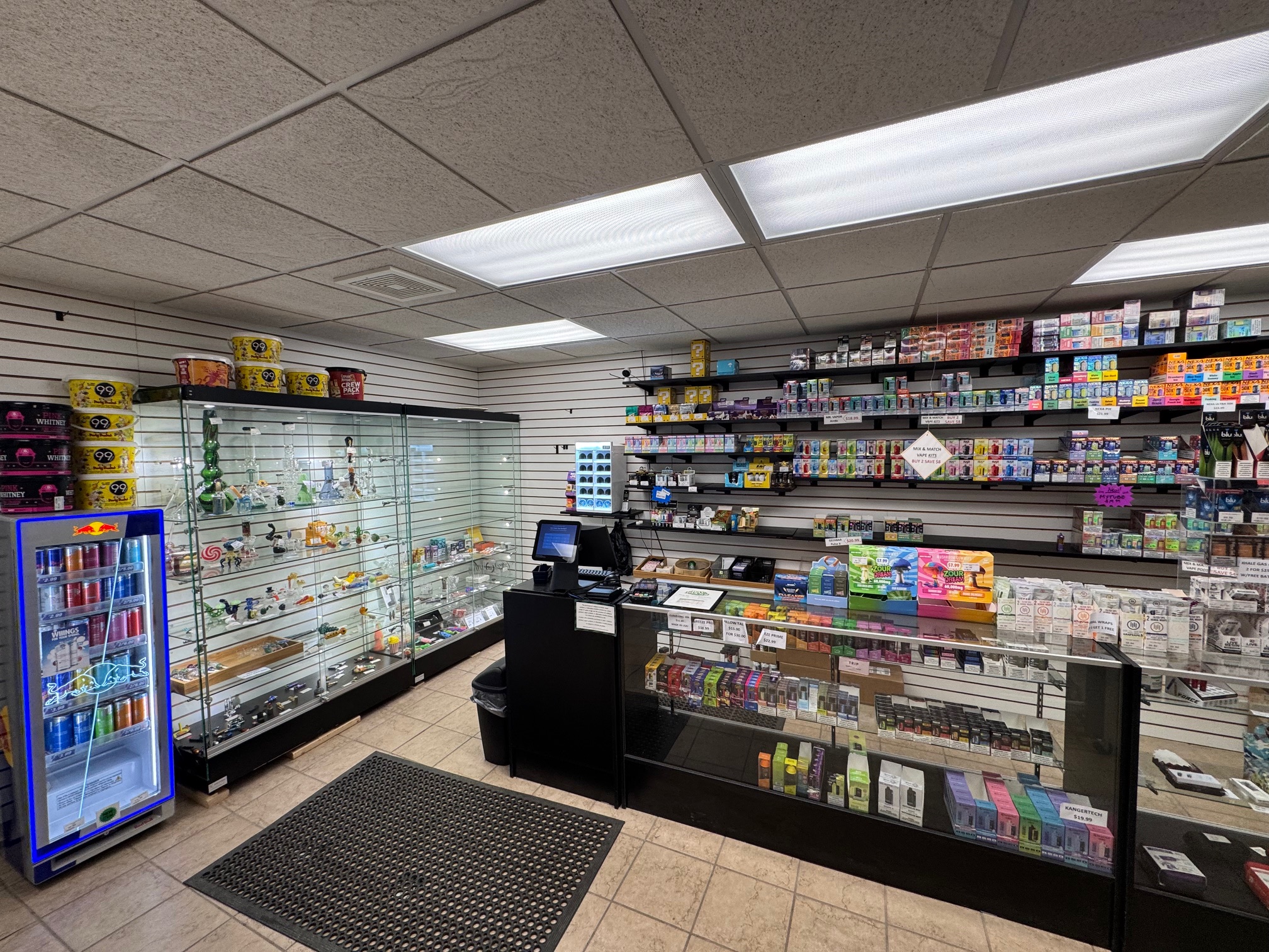 Bay Party Store smoke shop — cigars, pipes, and accessories on display